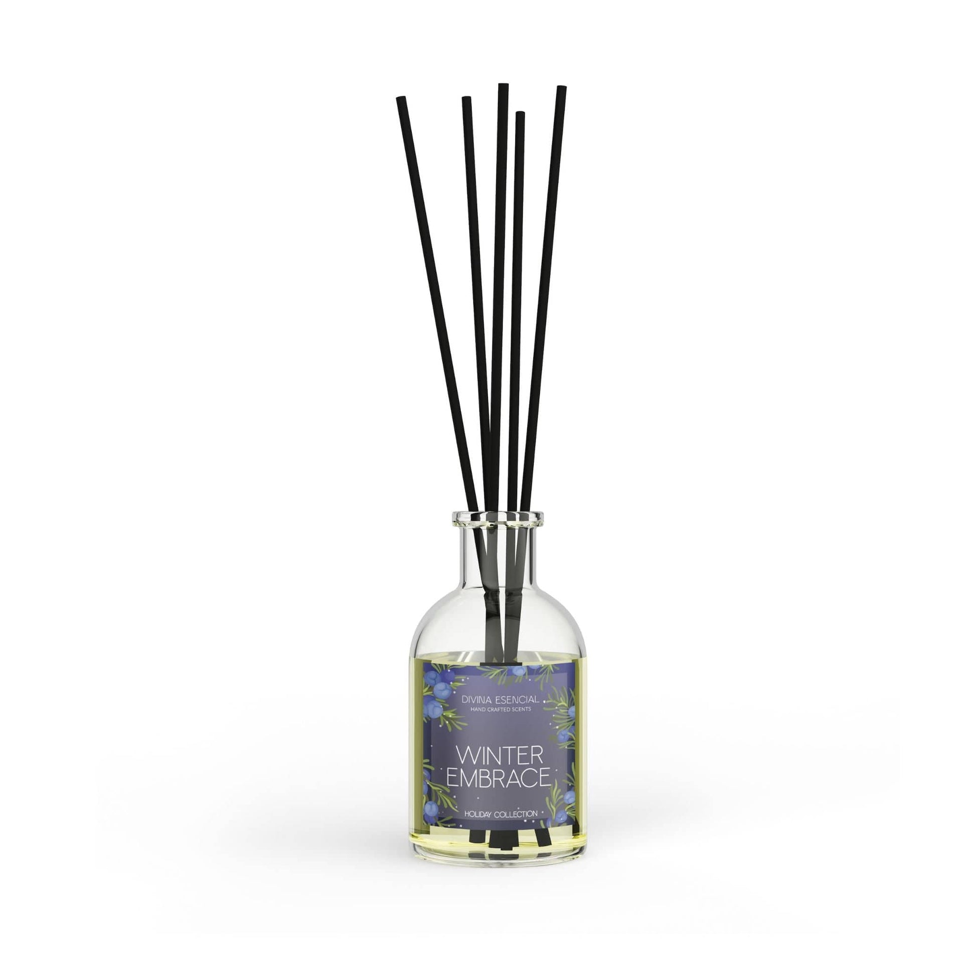 Diffuser bottle labeled 'Winter Embrace' with black sticks on a white background