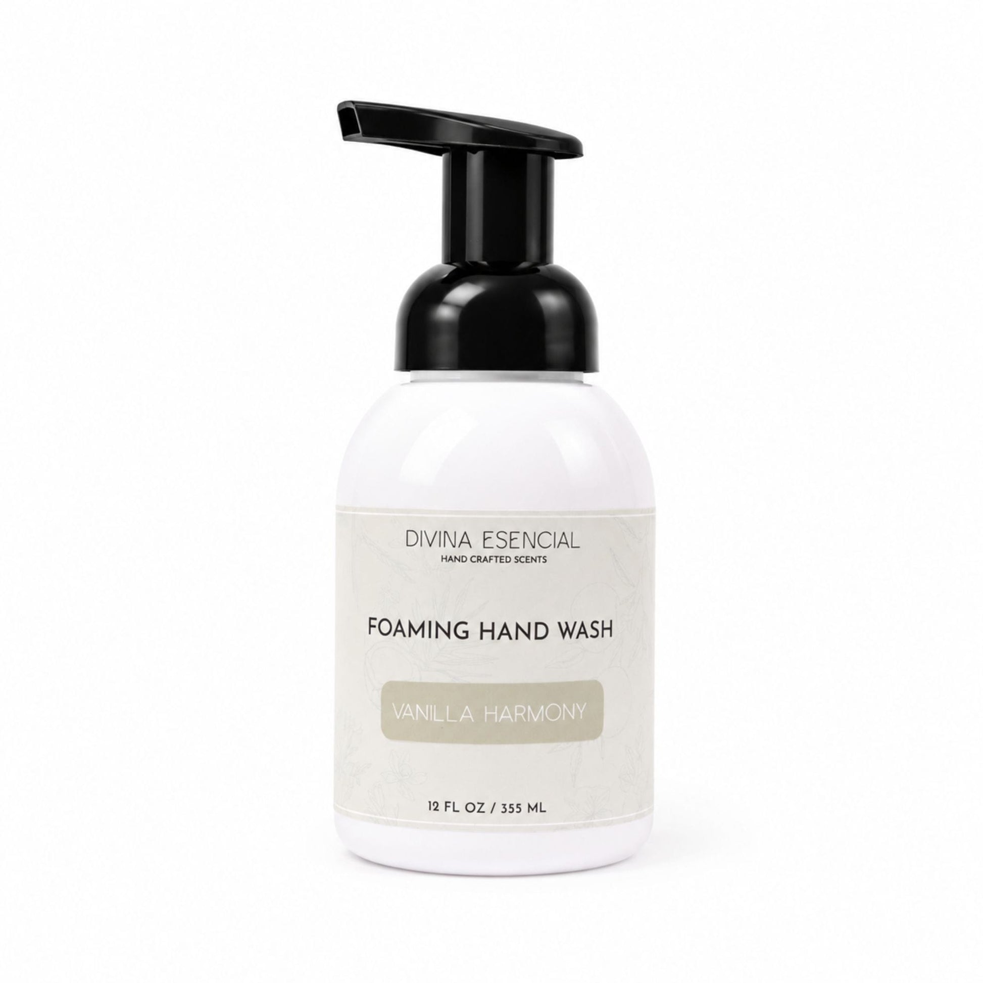 A white bottle of Divina Eesencial Foaming Hand Wash with a black pump dispenser and a cream-colored label, set against a plain white background.