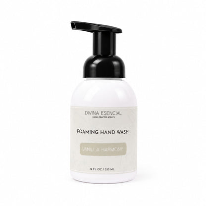 A white bottle of Divina Eesencial Foaming Hand Wash with a black pump dispenser and a cream-colored label, set against a plain white background.