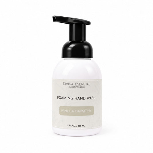 A white bottle of Divina Eesencial Foaming Hand Wash with a black pump dispenser and a cream-colored label, set against a plain white background.