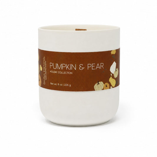 A white ceramic candle jar with a brown paper label reading 'Pumpkin & Pear Holiday Collection' on a clean white background.