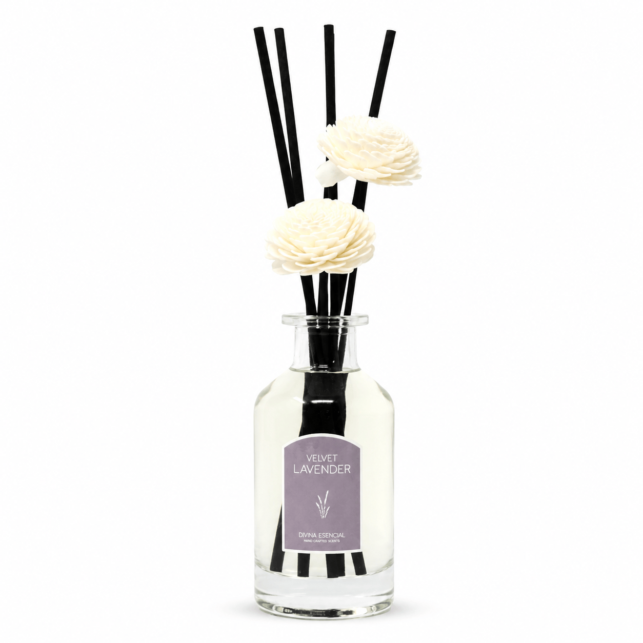 Diffuser with black reeds and white flowers labeled 'Velvet Lavender' on a white background